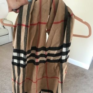 Brand new without tags Burberry scarf. Unisex